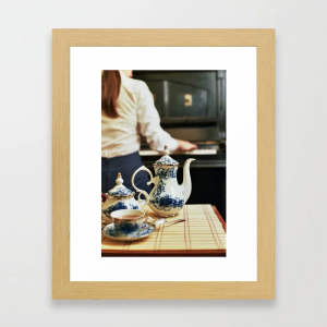 Tea pot and girl playing the piano Framed Art Print